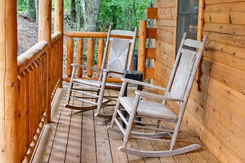 Wooden rocking chairs on the porch